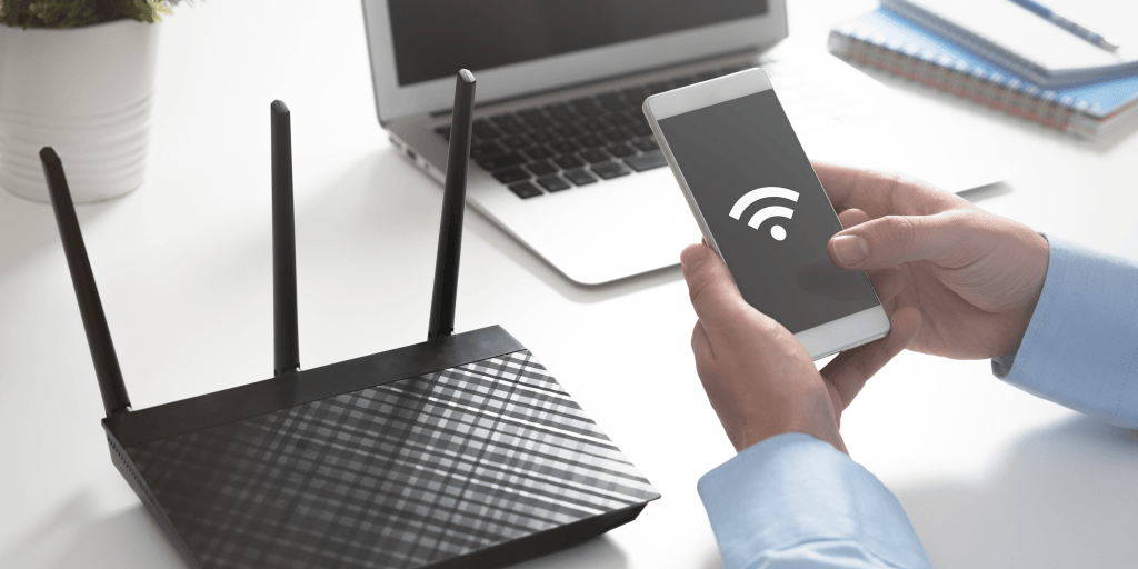 um modem de internet e um simbolo de wifi no celular