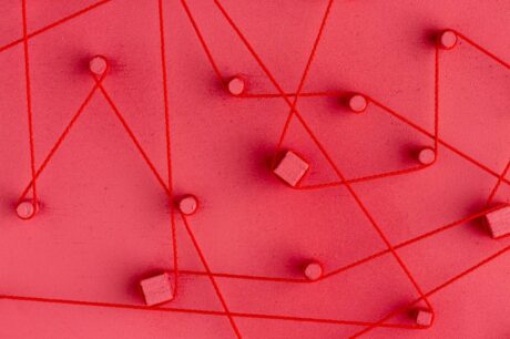um fundo abstrato com linhas e circulos na cor vermelha