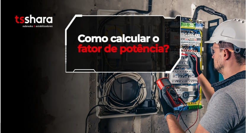 Técnico medindo fator de potência em painel elétrico.